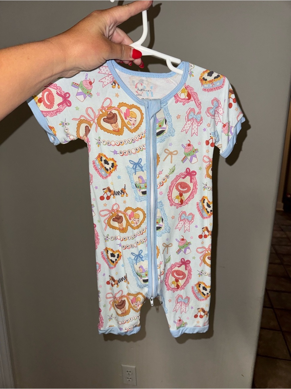 Short-Sleeve Baby Footie in Light Blue Trim with Sweet Treat Print